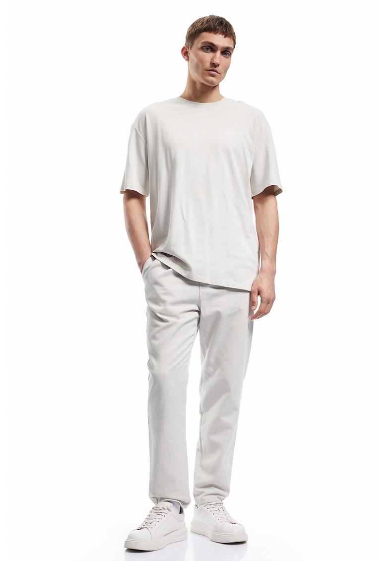 Oferte la Pantaloni conici de bumbac cu buzunare laterale - Alb murdar