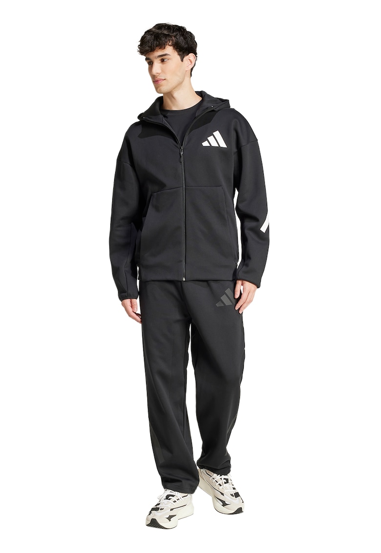 Oferte la Pantaloni de trening relaxed fit Z.N.E. - Negru/Negru stins