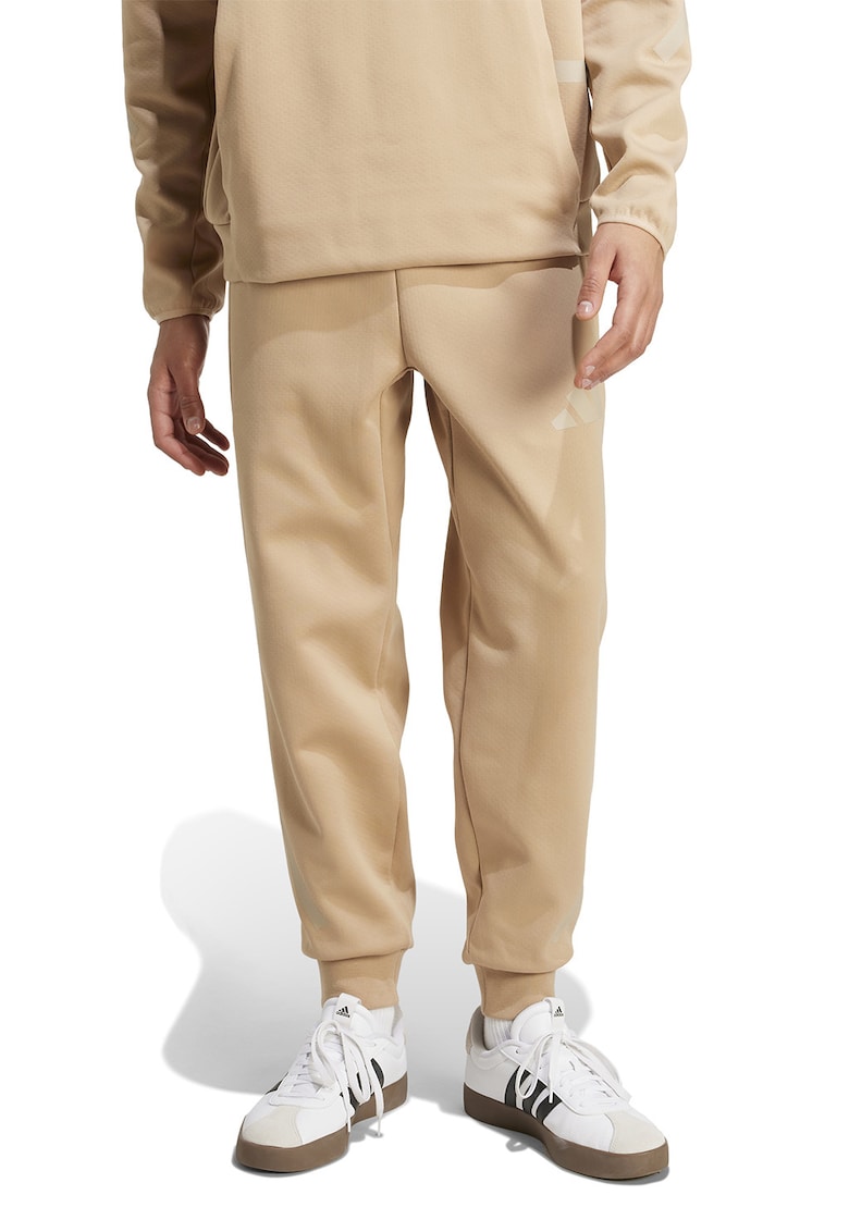Oferte la Pantaloni de trening relaxed fit cu snur Z.N.E. - Maro camel