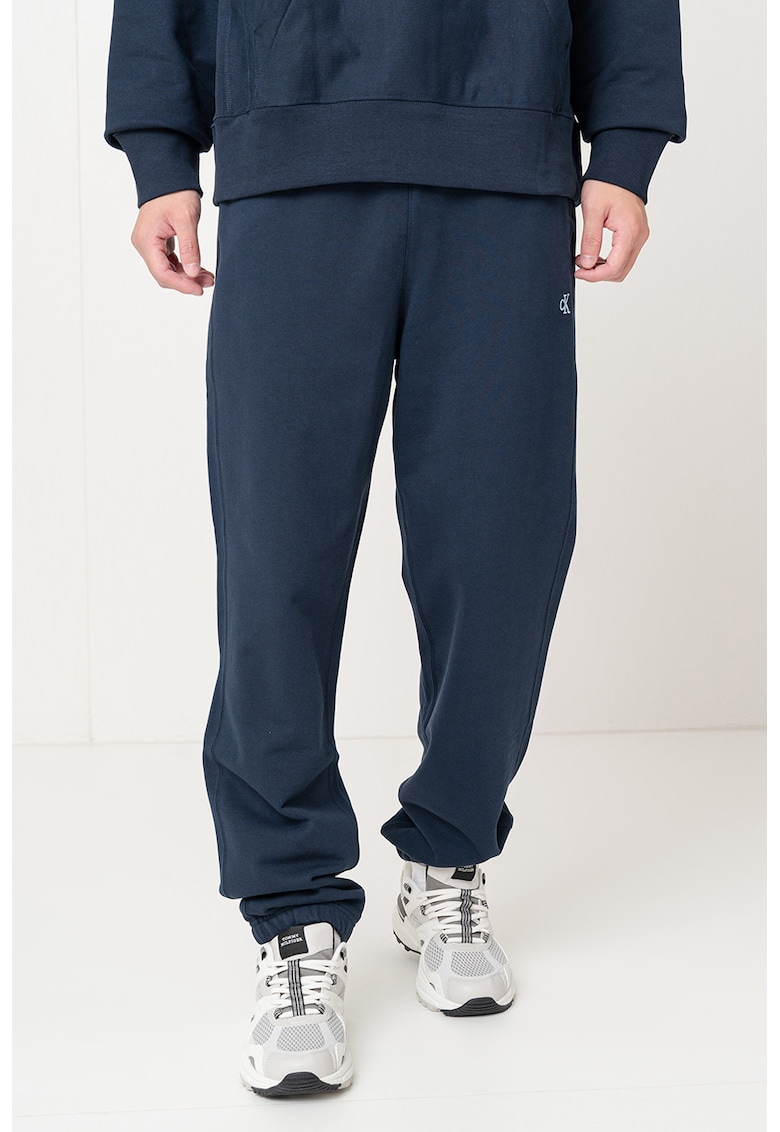 Oferte la Pantaloni de trening relaxed fit cu terminatie elastica - Bleumarin