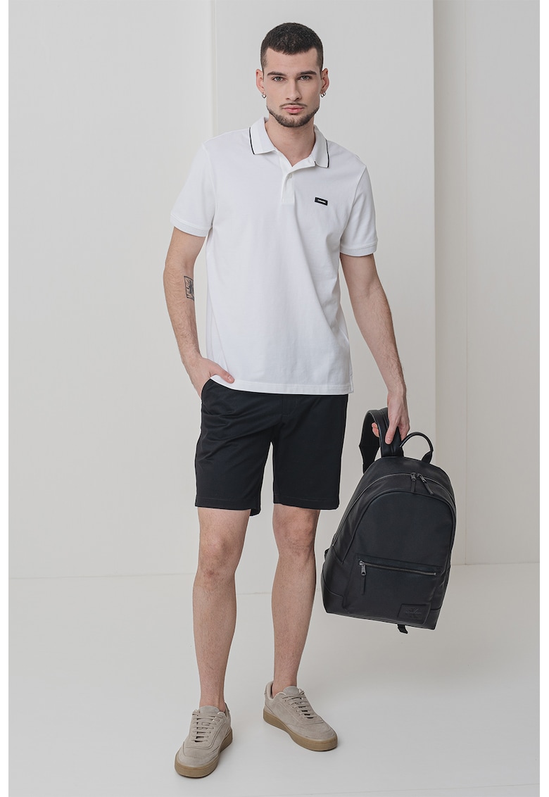 Oferte la Tricou polo din amestec de bumbac organic cu logo discret - Negru/Alb optic